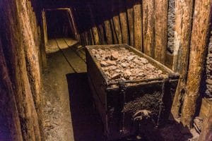 Old mine cart displayed inside the underground tunnels of Idrija Mercury Mine