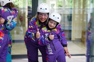 Family enjoying an indoor flying experience at Aerodium Logatec
