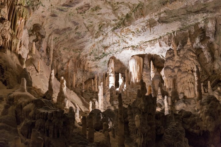 Stalactites and rock formations inside Postojna Cave in Slovenia